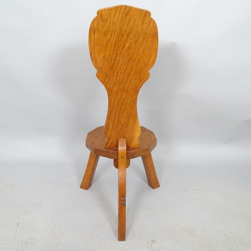 2587 - An oak spinning stool by Thomas Gnomeman Whittaker with carved yorkshire rose decoration and carved ... 