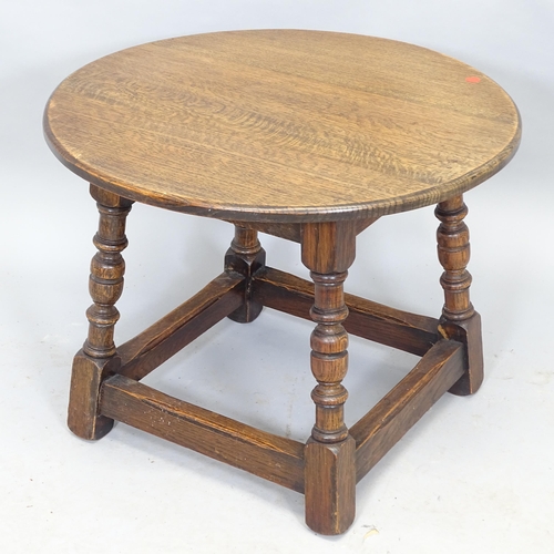 2590 - A circular joined oak lamp/occasional table. 61cm x 48cm, and another mahogany rectangular low coffe... 