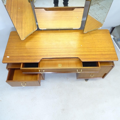 2601 - A mid-century teak G-plan dressing table with three fold mirror and five fitted drawers. 125cm x 134... 