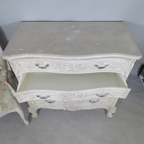 2603 - WITHDRAWN - A continental style painted chest of four drawers with carved decoration raised on cabri... 