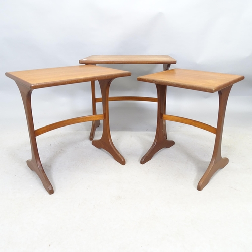 2608 - A mid-century teak nest of three occasional tables. Largest 56cm x 52cm x 41cm