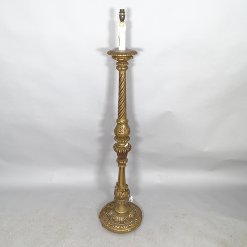 2610 - A gilt-painted standard lamp. Height to bayonet 144cm