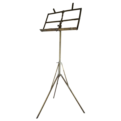 212 - An early 20th century patented brass music stand, impressed markings Harrow & Co, height 112cm