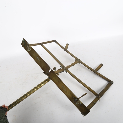 212 - An early 20th century patented brass music stand, impressed markings Harrow & Co, height 112cm