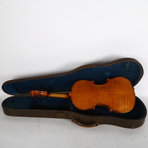 214 - A Vintage violin, no label, in a simulated crocodile case, bow not present, body length of violin 14... 