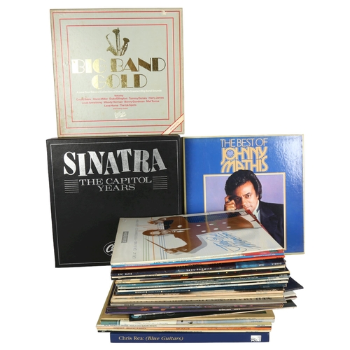 218 - A quantity of vinyl LPs, including Roxy Music, Style Council, Duke Ellington, Paul Simon, Frank Sina... 