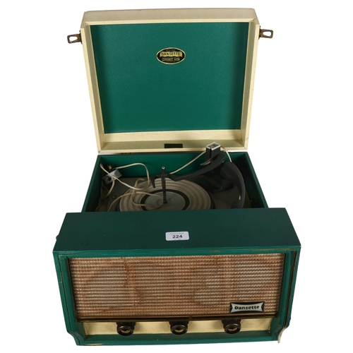 224 - A Vintage 1960s Dansette Conquest Auto record player, with front speaker and articulated turntable, ... 