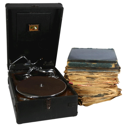 225 - An HMV portable gramophone, in black carry case, complete with pick-up and winding handle, and a box... 