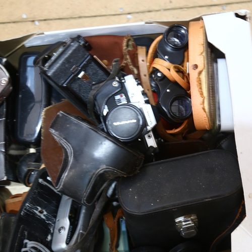 234 - A quantity of various Vintage cameras and binoculars, including Bolex, Olympus etc