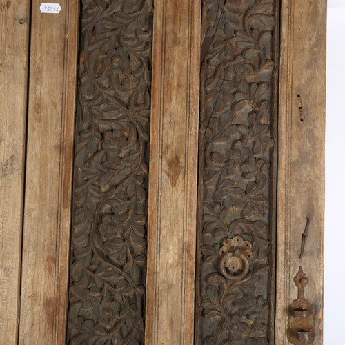 250 - An Antique wood hinged panel from a cupboard or wardrobe, with relief carved decoration, H110cm, W42... 