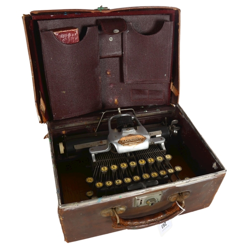 265 - BLICKENSDERFER - a Blick featherweight aluminium typewriter, in suitcase with original instruction m... 