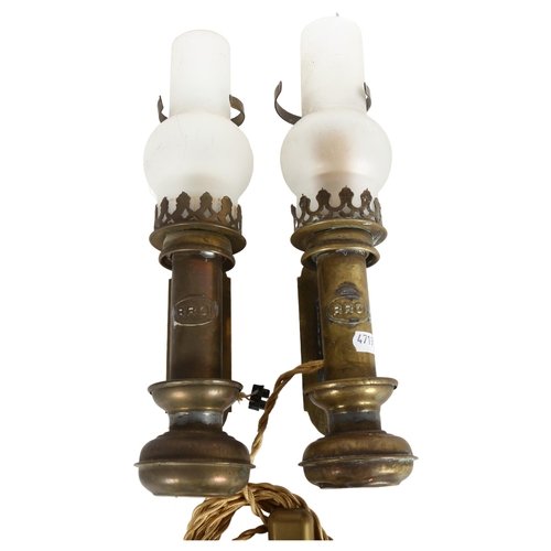 271 - A pair of Vintage French RRCI railway carriage lanterns, brass with glass funnels, height 31cm