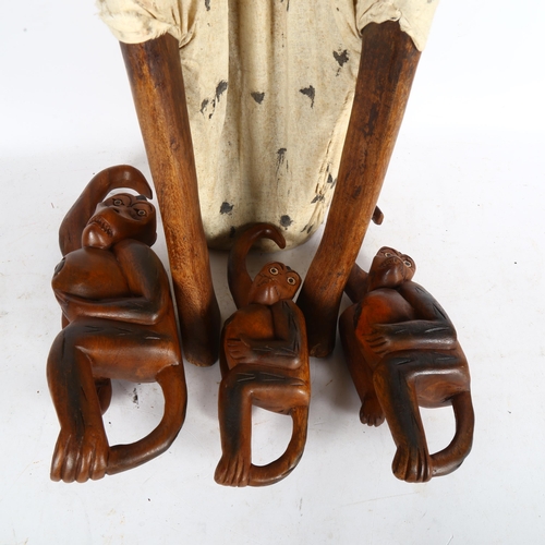 288 - A wooden carved African figure, and a group of hanging monkeys, largest height 73cm