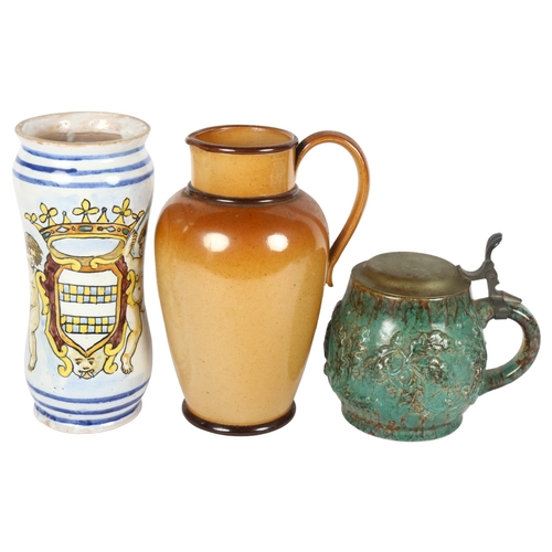 305 - An Antique Italian faience chemist jar, a Doulton stoneware jug, and an acorn leaf embossed stonewar... 