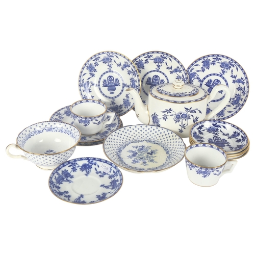 315 - A quantity of Mintons Delft, including a teapot and tea cups and bowls, with Oriental decoration