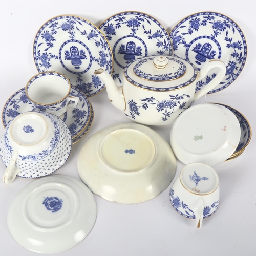 315 - A quantity of Mintons Delft, including a teapot and tea cups and bowls, with Oriental decoration