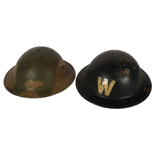 329 - A World War II air raid warden's helmet with original insert and strap, and a Brodie helmet, with or... 