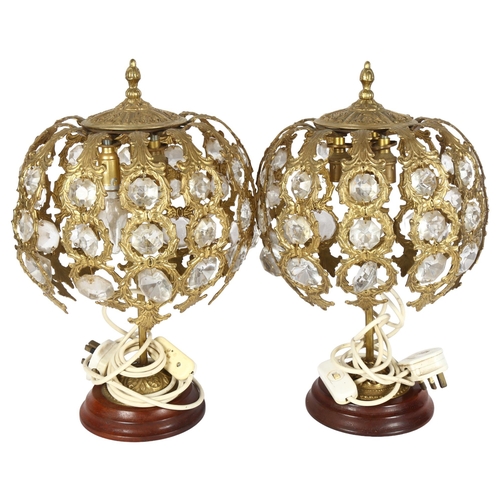 337 - A pair of gilt-metal waterfall design triple-fitted table lamps, height 42cm