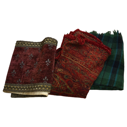 429 - A modern patterned throw, a tartan travel blanket, and a runner, length 124cm, with fleur de lis des... 