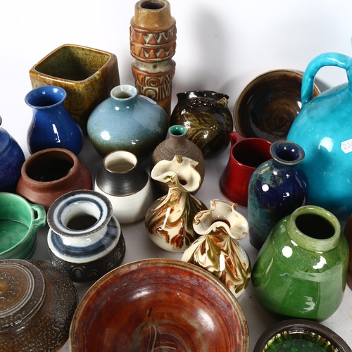 432 - Various Studio and Art pottery jugs and vases, including Branham, a blue glazed coffee pot on 3 feet... 