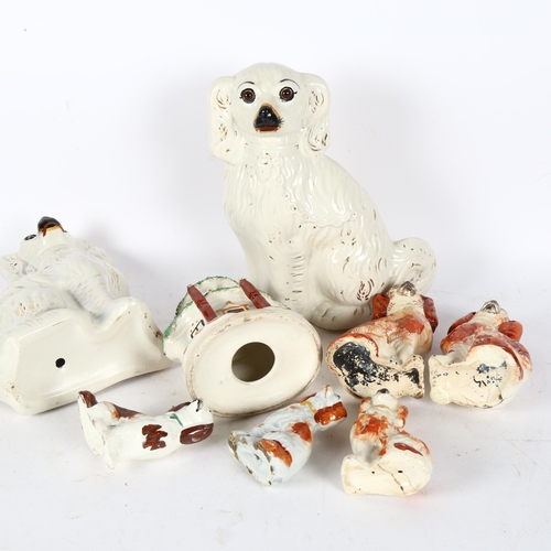 433 - A pair of white Staffordshire Spaniels, height 25cm, a smaller pair, cottage money box etc