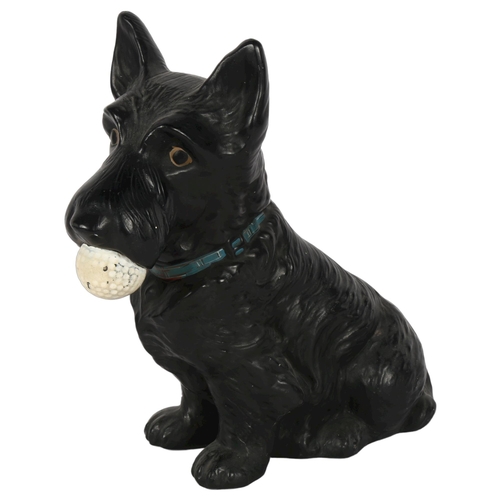 437 - A Vintage Sylvac black Scottie dog with golf ball, no. 1209, 28.5cm