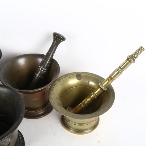 456 - A group of 5 various bronze and brass pestle and mortars, and a small bag of coins