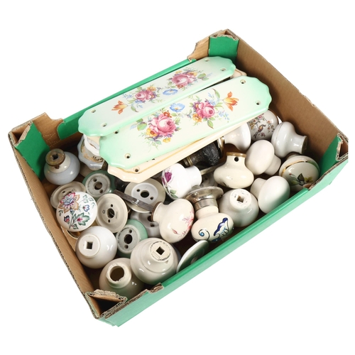 459 - A box of ceramic and other door knobs, and various ceramic finger plates