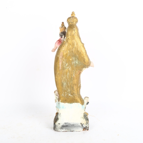 461 - An Antique painted and gilded terracotta Madonna and Child, 30cm