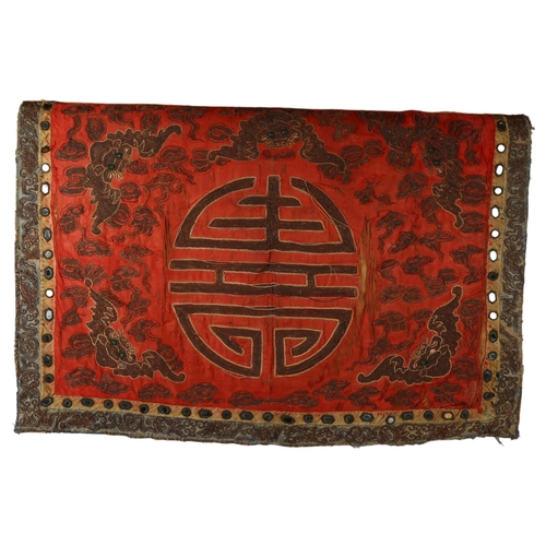 501 - An Oriental wall hanging with embroidered decoration and inset mirror glass, 63cm x 89cm