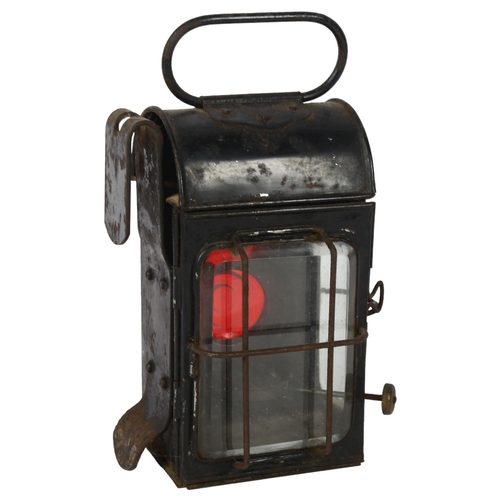 516 - An Antique carriage lamp with red bull's eye lens, height 23.5cm