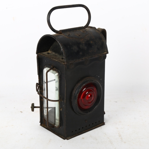 516 - An Antique carriage lamp with red bull's eye lens, height 23.5cm