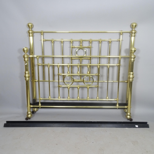 2670 - A modern brass 5' double bed, with side rails.