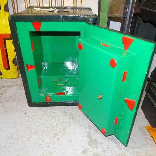 2696 - A painted metal floor safe, 46 x 62 x 45cm (with key)