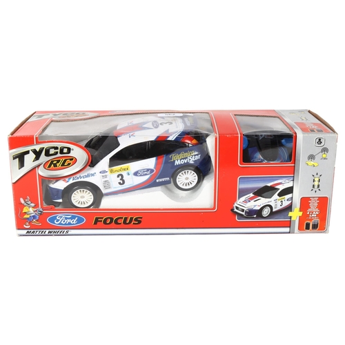 562 - A Tyco remote control Ford Focus toy rally car, boxed