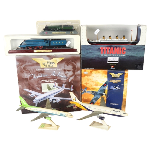 572 - A quantity of boxed Vintage toys, including a 1/1136 scale model of the Titanic by Playtown, a Corgi... 