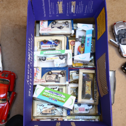 581 - A quantity of Burago, Corgi, Days Gone etc diecast vehicles, vehicles are both loose and boxed (27)