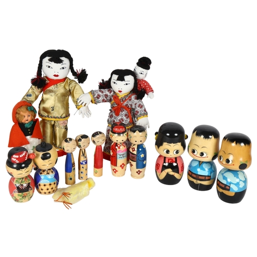 602 - A quantity of Kokeshi and various other Japanese style dolls, largest height 26cm