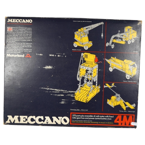 604 - A Vintage 1970s Meccano set, appears complete with original instruction manuals, 4M