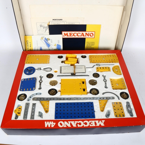 604 - A Vintage 1970s Meccano set, appears complete with original instruction manuals, 4M