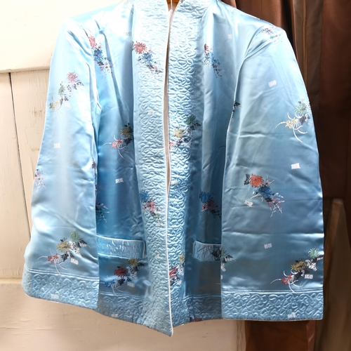 609 - An Oriental embroidered silk jacket, and a Kimono