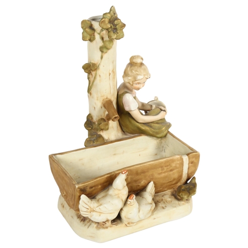 632 - Royal Dux group, girl and hens by a trough, height 25cm