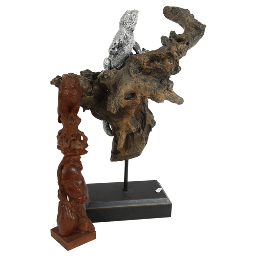 640 - 2 carved wood sculptures - girl with owl, 38cm, and an iguana on a branch