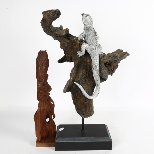 640 - 2 carved wood sculptures - girl with owl, 38cm, and an iguana on a branch