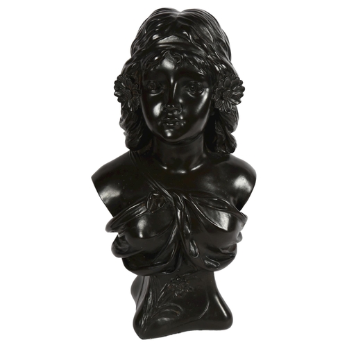 642 - A composition bust of a girl, 47cm