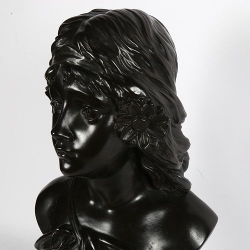 642 - A composition bust of a girl, 47cm