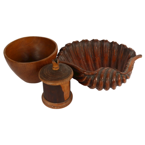 643 - A large carved mahogany clam shell bowl, a turned oak bowl, and turned wood twine dispenser (3)