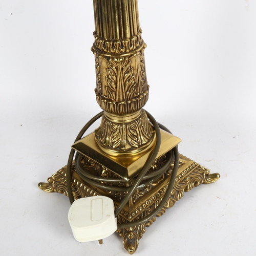 649 - A brass table lamp with acanthus leaf design, height 54cm