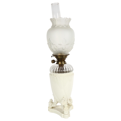 650 - A Royal Worcester ivory porcelain oil lamp, model no. 1576, with Hinks's duplex no. 2 burner, with c... 