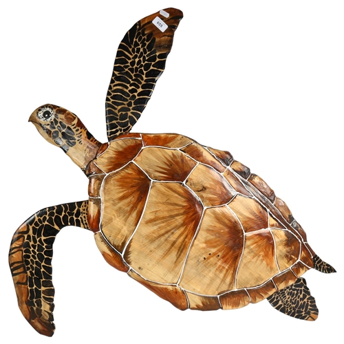 655 - A painted wood wall-mounted turtle, 92cm